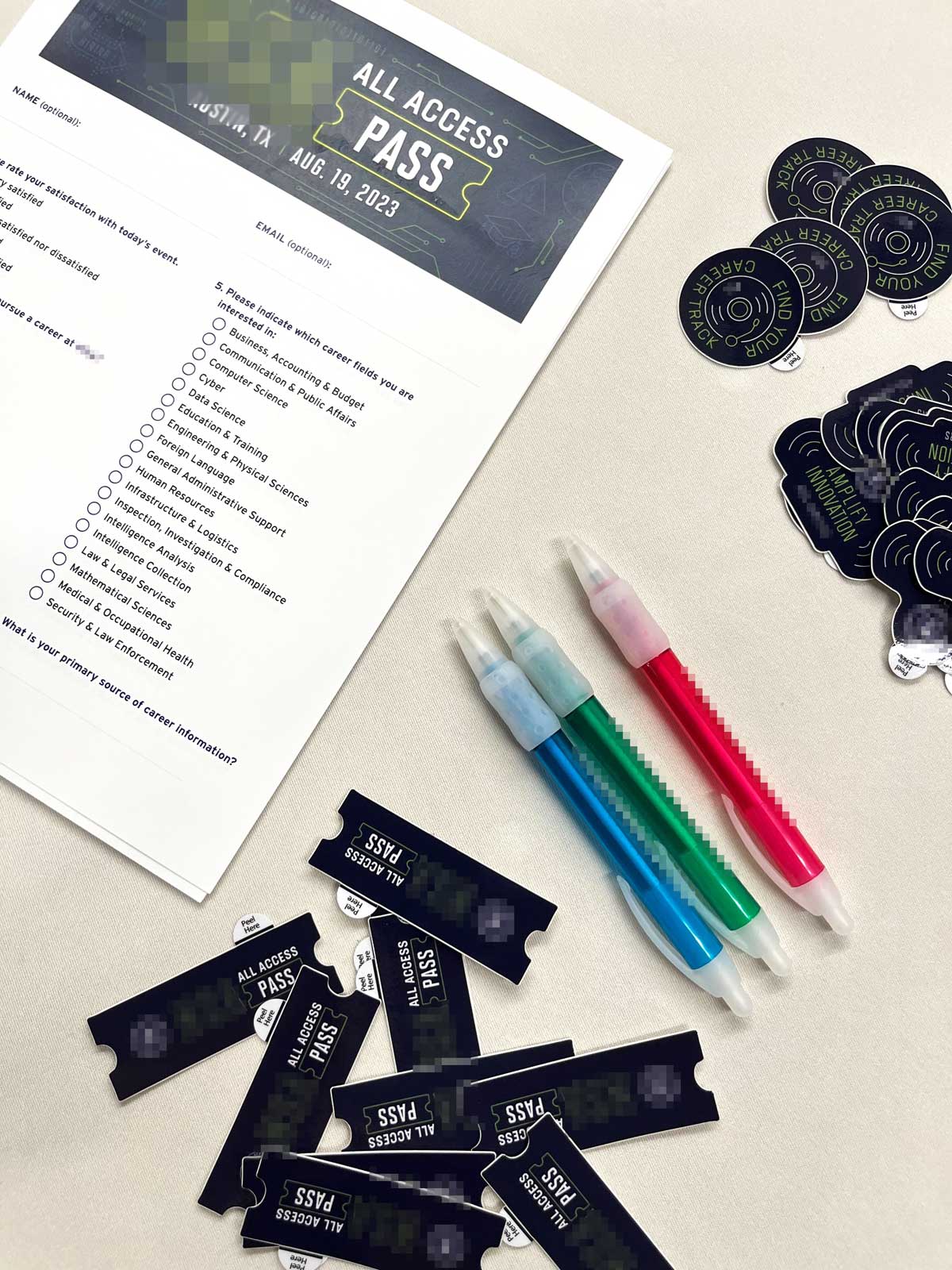 Survey form with stickers and pens on the side