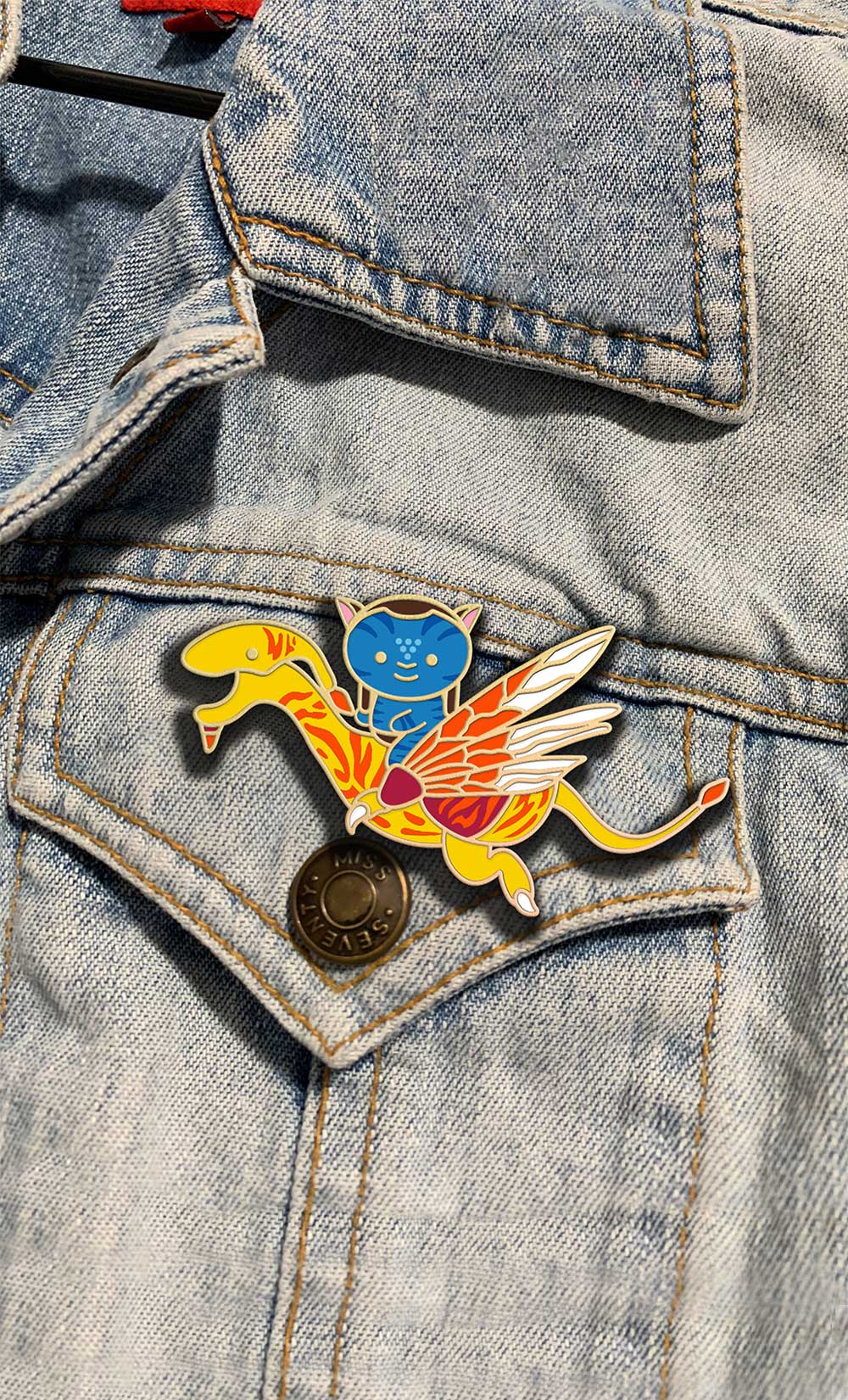 Chibi Jake & Banshee metal pin on a jean jacket