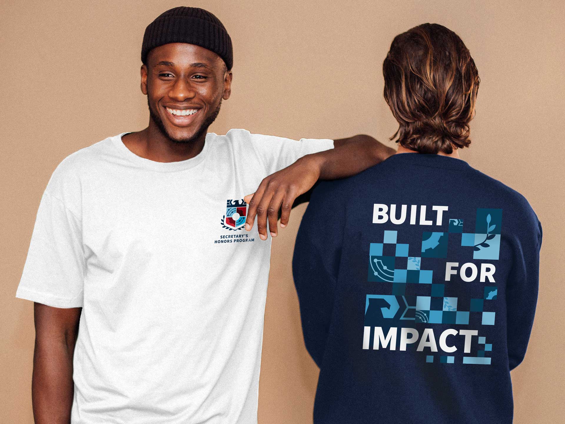 Two men wearing Secretary's Honors Program designed apparel
