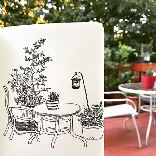 Ink pen sketch of flowers on a patio